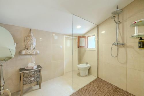 a bathroom with a shower and a toilet at Casa Rural Lliber in Lliber