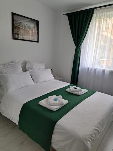 Katil atau katil-katil dalam bilik di Mia Apartments