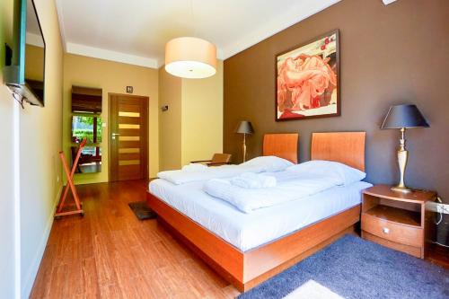 Katil atau katil-katil dalam bilik di Marea by Baltic Home