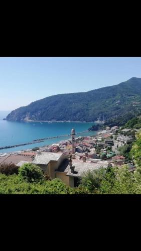 a view of a town and a body of water at Casa JEANMARC in Moneglia