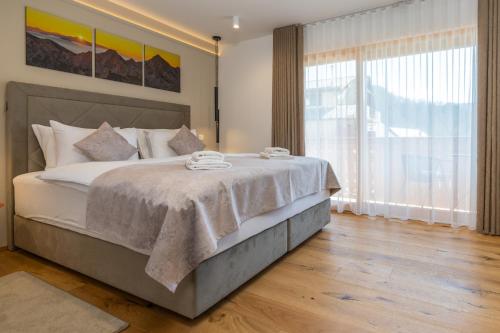 Katil atau katil-katil dalam bilik di Landhouse Bled