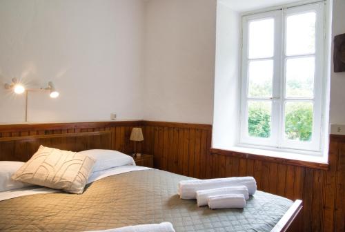 Postel nebo postele na pokoji v ubytování Casa nel parco