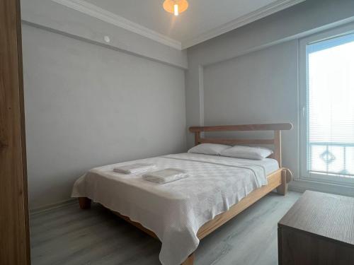 Postel nebo postele na pokoji v ubytování Mavikoy Apart