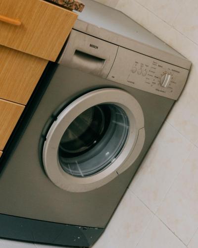 a washing machine is sitting in a room at Camping Santa Elena in Lloret de Mar