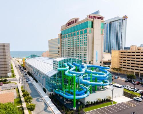 a large water slide in the middle of a city at Beachfront 1BR 2BA Condo CozySuites at Showboat in Atlantic City