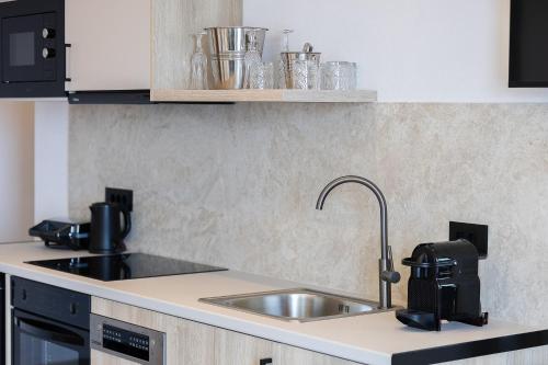 Kuchyň nebo kuchyňský kout v ubytování Celeste Bali Suites