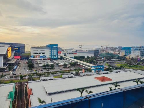 Nespecifikovaný výhled na destinaci Manila nebo výhled na město při pohledu z apartmánu