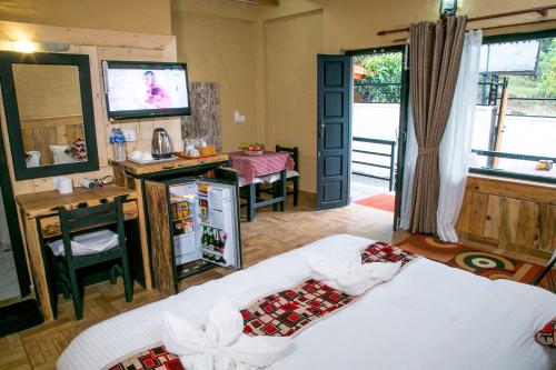 Postel nebo postele na pokoji v ubytování Hotel Tourist Residency