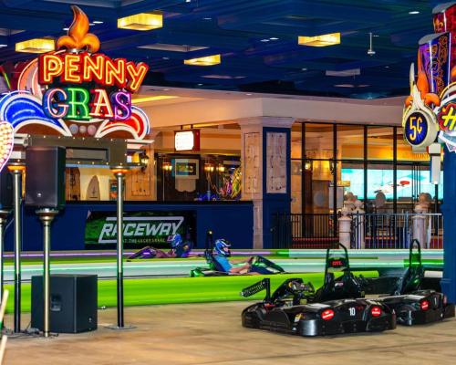 a group of racing cars parked in front of a casino at Beachfront 1BR 2BA Condo CozySuites at Showboat in Atlantic City