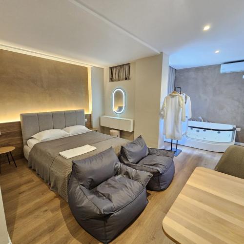 Postel nebo postele na pokoji v ubytování Jacuzzi Apartment Tirana Center