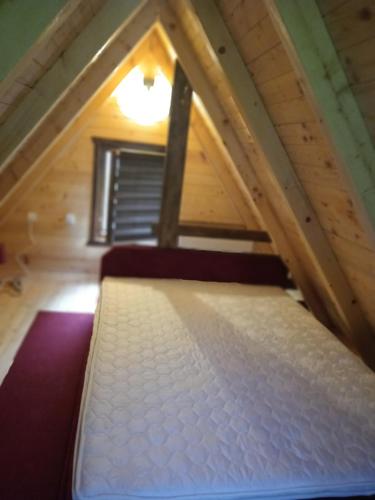 a mattress in the attic of a room at Sicevacka Bajka in Niš