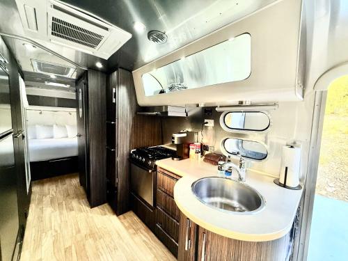 a bathroom with a sink in an rv at Airstream Canyon in Orderville