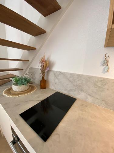 Η κουζίνα ή μικρή κουζίνα στο Appartement pieds dans l eau vue mer