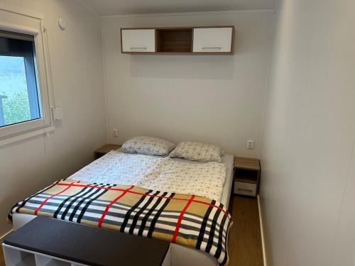 Ένα ή περισσότερα κρεβάτια σε δωμάτιο στο Premium Chalet B, close to the lake, quiet location