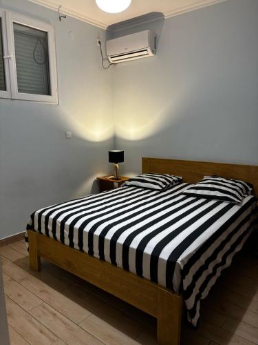 Postel nebo postele na pokoji v ubytování Tan'Mayeva appart T2
