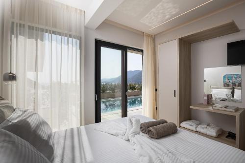 Postel nebo postele na pokoji v ubytování Celeste Bali Suites