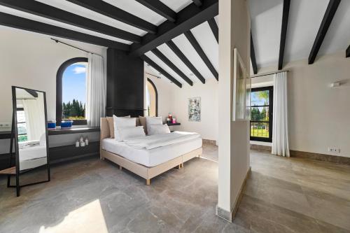 Ένα ή περισσότερα κρεβάτια σε δωμάτιο στο Luxus Finca Passion