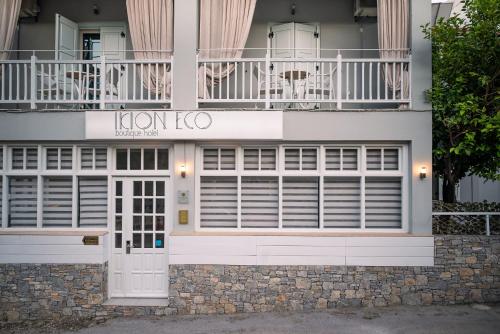a building with a sign that reads lioncolo at Ikion Eco Boutique Hotel in Patitiri