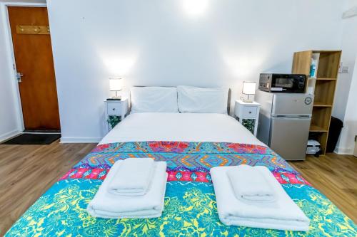 En eller flere senge i et værelse på Glastonbury - ContactlessCheckIn - Free Parking