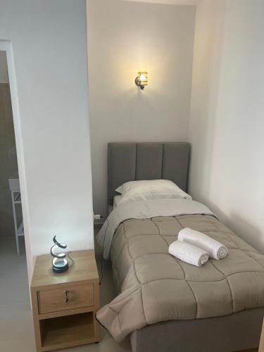 Katil atau katil-katil dalam bilik di Hotel Familja Çuni Theth