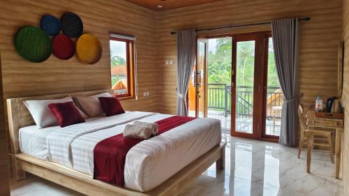 Ένα ή περισσότερα κρεβάτια σε δωμάτιο στο Green Pacing Lodge