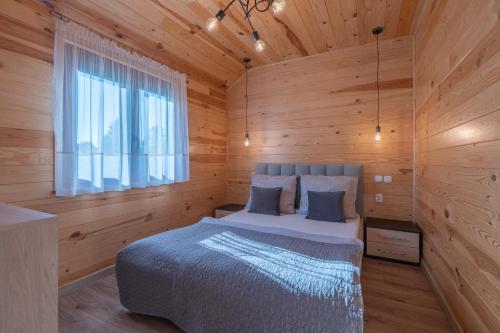 Postel nebo postele na pokoji v ubytování Chatki u Patki