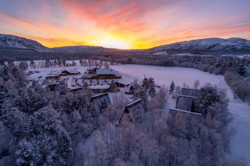 an aerial view of a house in the snow at Holmen Husky Lodge in Alta