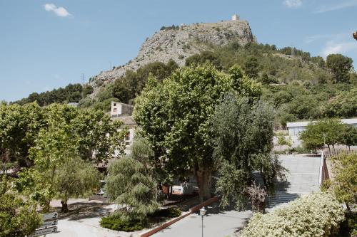 a view of a mountain with trees in front at Hotel Anna in Cocentaina