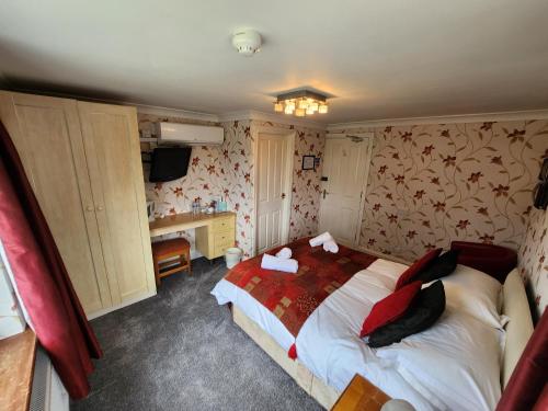 Ένα ή περισσότερα κρεβάτια σε δωμάτιο στο OYO Lavender House Hotel