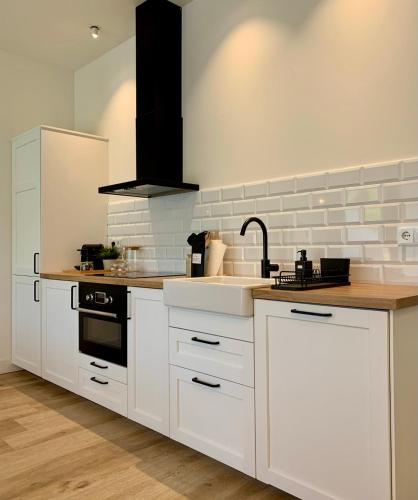 Dapur atau dapur kecil di Apartamentos Campo Mingo