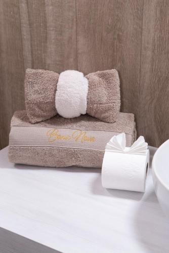 a pile of towels sitting on top of a table at BONA NOVA-Puglia Living in Massafra