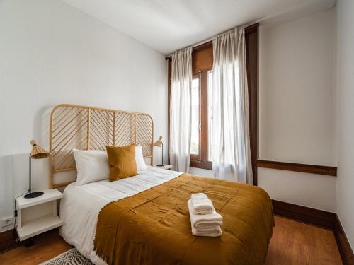 Ένα ή περισσότερα κρεβάτια σε δωμάτιο στο Akisol Troia Retreat