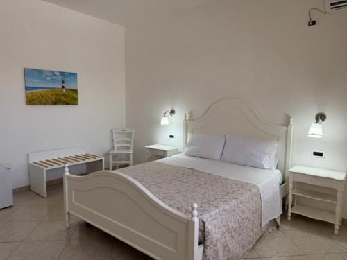 Ένα ή περισσότερα κρεβάτια σε δωμάτιο στο B&B White Rooms Salento