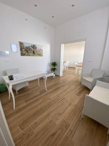 Ένα ή περισσότερα κρεβάτια σε δωμάτιο στο B&B White Rooms Salento