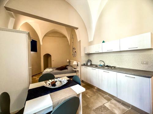 Kuchyň nebo kuchyňský kout v ubytování Finya Apartments - Affitti Brevi Italia