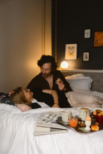 Letto o letti in una camera di Hôtel Belleval