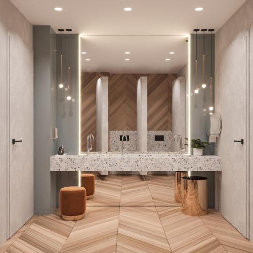 a kitchen with a counter top and wooden floors at INFINITY Budapest Hotel in Budapest