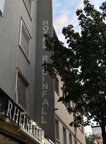 a sign on the side of a building at Hotel Rheinfall in Neuhausen am Rheinfall