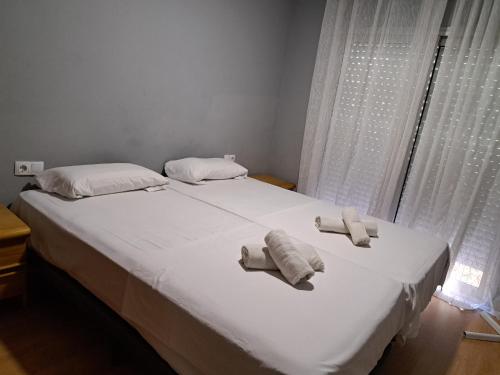 Posteľ alebo postele v izbe v ubytovaní Piso Acogedor Fortuny