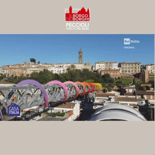 a view of a city with buildings in the background at La Casa del Borgo in Peccioli