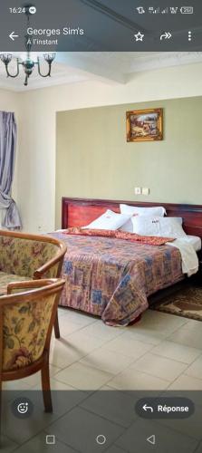 Postel nebo postele na pokoji v ubytování Hôtel vallée des rois