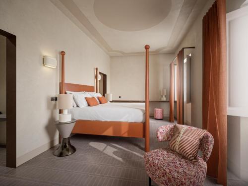 Giường trong phòng chung tại Della Calza Retreat & Spa