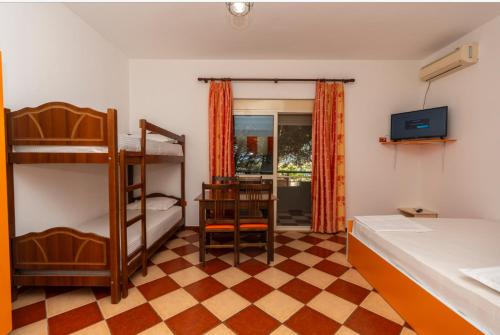 Postelja oz. postelje v sobi nastanitve Hotel Otrant