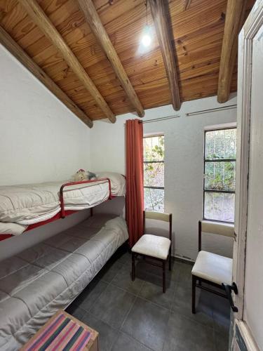 Ένα ή περισσότερα κρεβάτια σε δωμάτιο στο Las Lavandas Potrerillos