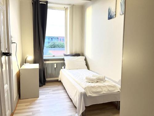 Ένα ή περισσότερα κρεβάτια σε δωμάτιο στο Three bedroom apartment in Frederikshavn,.