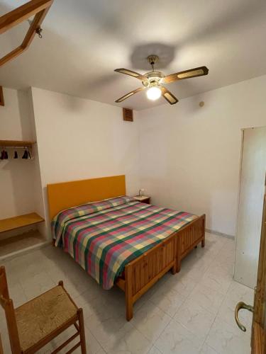 Ένα ή περισσότερα κρεβάτια σε δωμάτιο στο Agriturismo Millepini