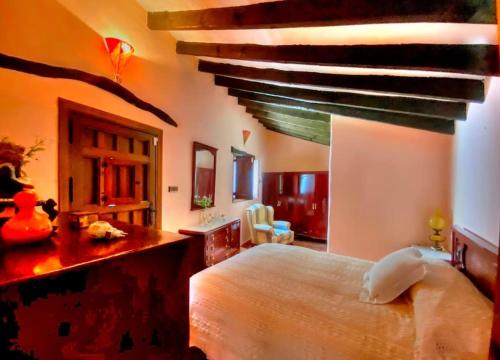 Ένα ή περισσότερα κρεβάτια σε δωμάτιο στο el Refugio de la Axarquía