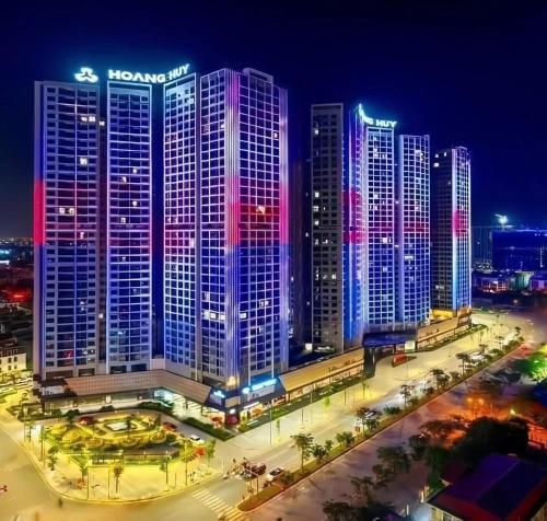 a group of tall buildings in a city at night at LAD Apartment & Homestay Hai Phong - Hoàng Huy Commerce Vo Nguyen Giap in Hai Phong