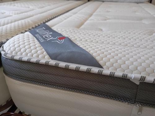 Postel nebo postele na pokoji v ubytování Repubblica Area Cagliari