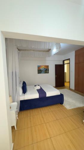 Ένα ή περισσότερα κρεβάτια σε δωμάτιο στο Wander home 3bedroom